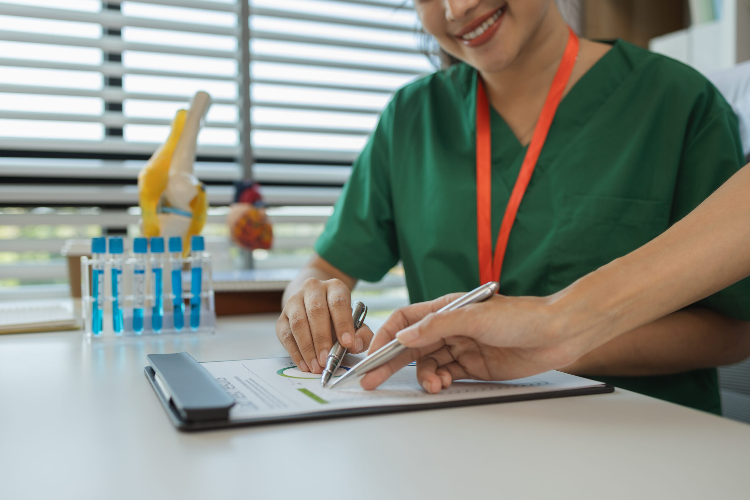 healthcare leader reviewing documentation, representing accountability and decision-making in healthcare leadership